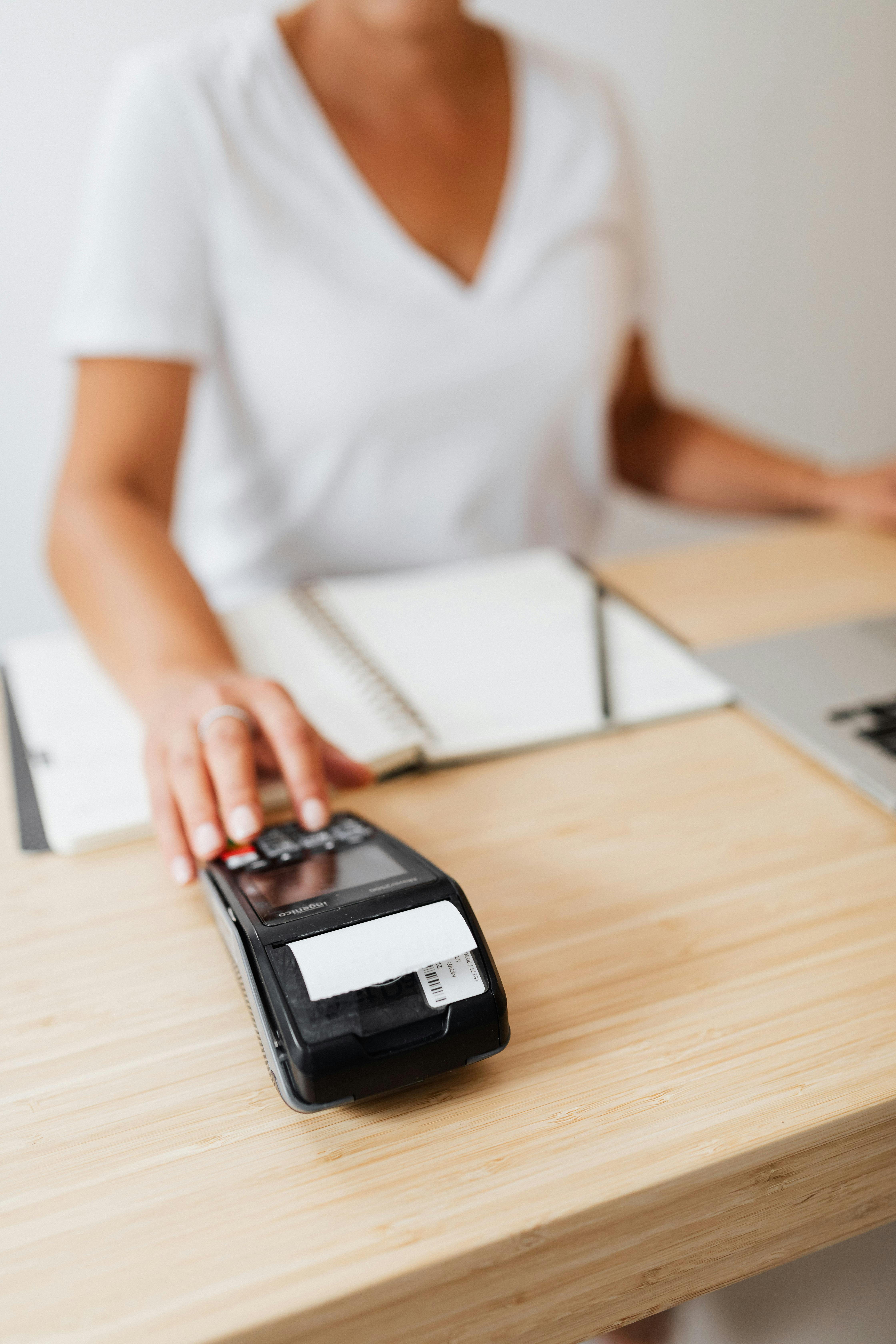 Modern payment terminal at a professional service desk